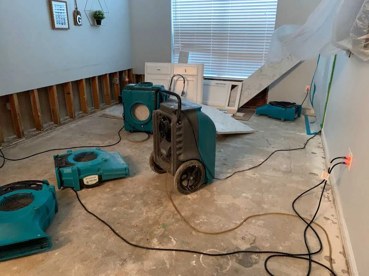 Dehumidifier in flood-cut room for Water Damage Restoration in Dulles Town Center